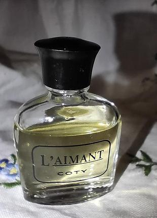 Винтажные миниатюрные духи l' aimant coty.