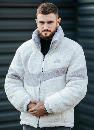 Двосторонній пуховик nike blue and white