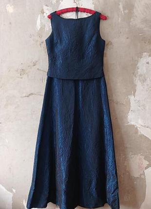 Стильний та елегантний жіночий костюм-двійка у глибокому синьому кольорі з передовому та ефектною жатою текстурою