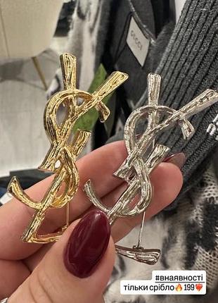 Брошка жіноча