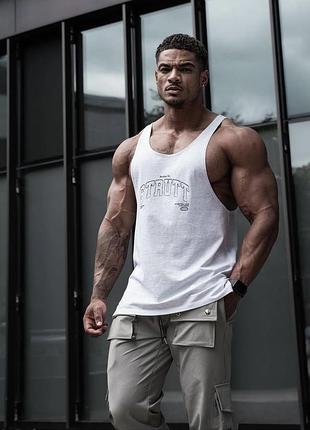 Нова фірмова  спортивна майка strutt