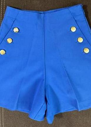 Шорти бермуди з гудзиками з карманами