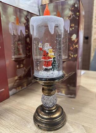 Санта клаус декоративна новорічна led свічка зі снігом, 25см, від батарейок та usb