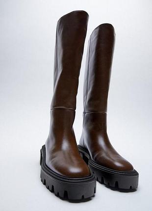 Кожаные сапоги женские