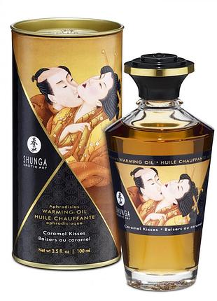 Їстівна зігрівальна масажна олія aphrodisiac warming oil caramel kisses 100 мл