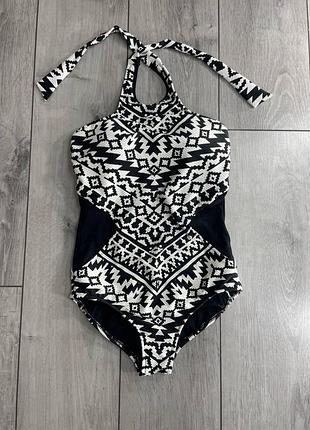 Суцільний купальник