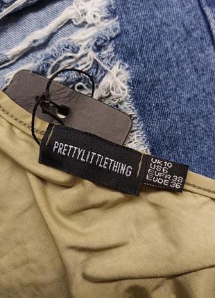 Обтягуючий укорочений топ з круглим вирізом prettylittlething5 фото