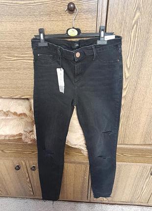Штани джинси 
стрейчевые зауженные новые