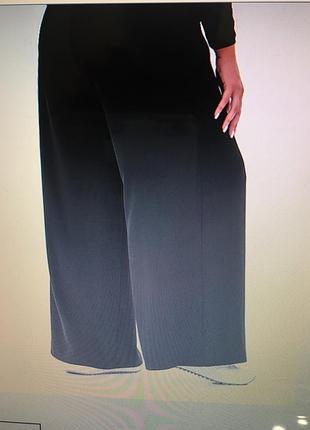 Штани вільного крою головна особливість яких — великі накладні кишені з боків — великий розмір