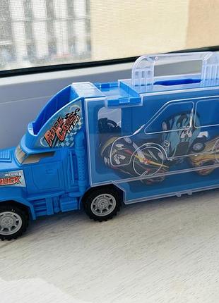 Трейлер з машинками