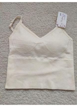 Топ з дефектом