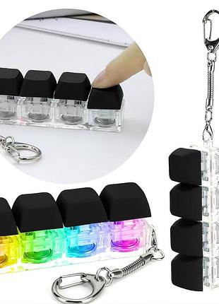 Брелок-клавіатура антистрес, 4 клавіші, led, прозорий чорний корпус