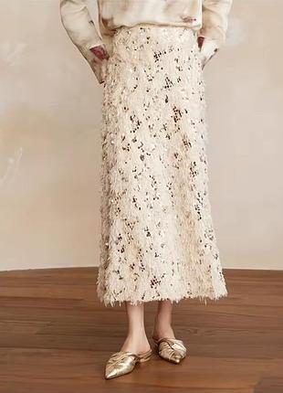 Спідниця міді з пірʼям і паєтками