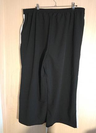 Широкі брюки з лампасами