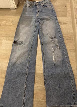 Прямі кльош палацо джинси рвані  порвані на колінах