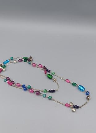 Красивые разноколеворные бусы с колокольчиками, а также сельскими и пластиковыми бусинами.