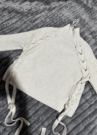 Светр вʼязаний