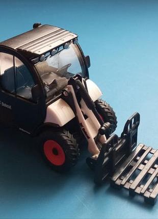 Игрушка погрузчик