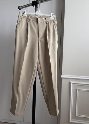 Бежеві жіночі штани з защіпами, розмір м