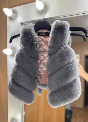 Дитячий хутряний жилет для дівчинки