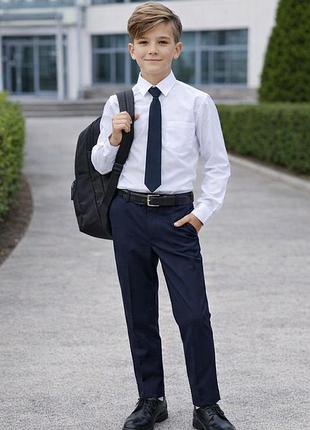 Шкільна  форма розмір 140 брюки, сорочка