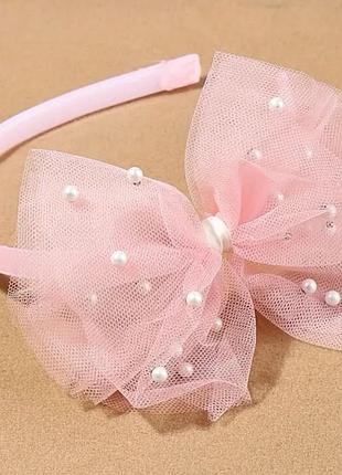 Ободок для волос розового цвета