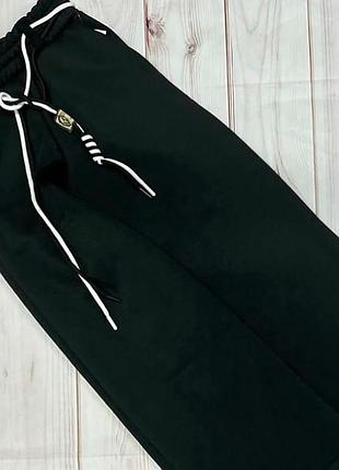 Теплі на хутрі палаццо