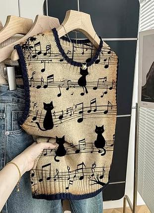 Жіноча жилетка