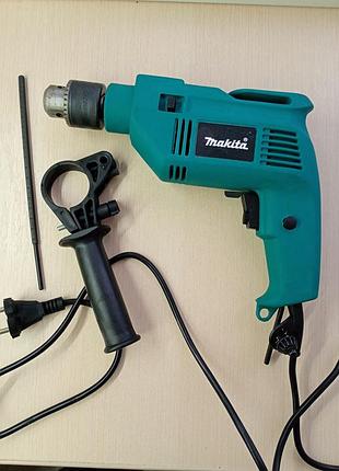 Дриль ударний з реверсом і регулюванням обертів  makita 710 вт новий