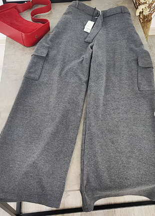 Стильні широкі сірі брюки з кишенями карго primаrk