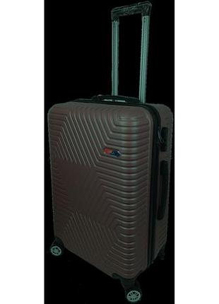 Пластиковый чемодан на колесах среднего размера 70l gd polo коричневый