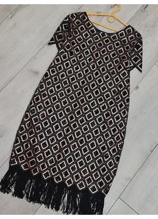 Ошатне плаття в паєтках з бахромою