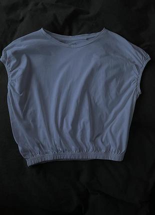 Легкий білий кроп-топ з еластичним низом