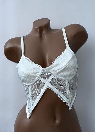 Белое кружевное бюстье с перекрестными лямками. на бретелях xs-s кружевной бра бралетт топ молочний
