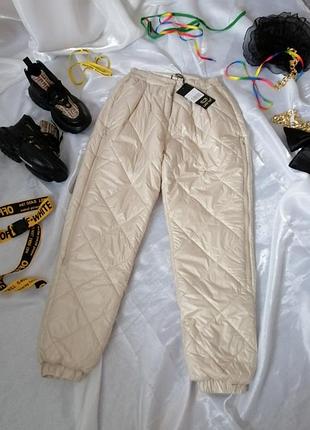Теплі стьобані штани на синтепоні джоггери
