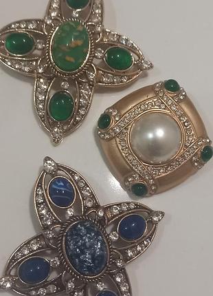 Брошка, геральдика