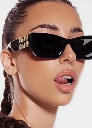 Жіночі окуляри miu miu