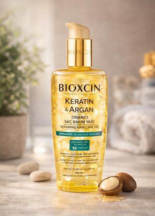 B i o x c i n  ( олія для пошкодженного волосся )