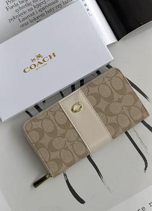Кошелек coach accordion zip wallet молочный е