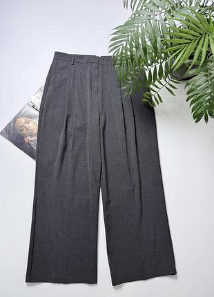 Штани широкі із защипами