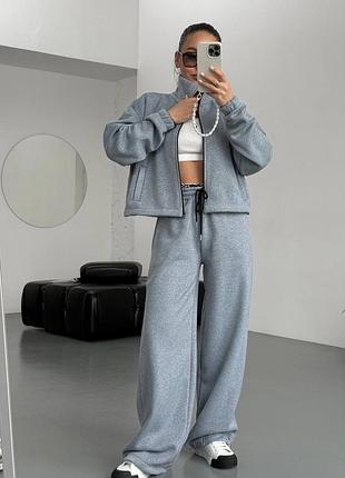 Повсякденний жіночий спортивний костюм на флісі оверсайз крою зіп худі на блискавці без капюшона та штани палаццо на резинці зі шнурком
