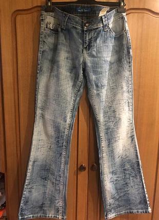 Нові модні джинси кльош.