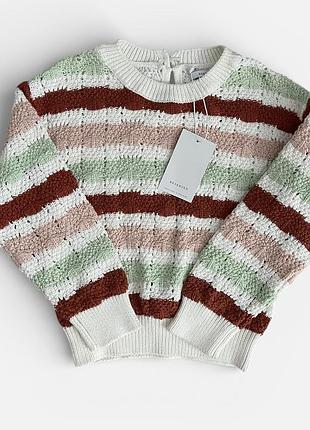 Ажурний светр у смужку