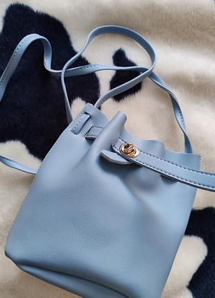 Блакитна сумочка miniso