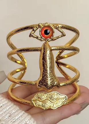 Золотий браслет манжет schiaparelli тренд 2026