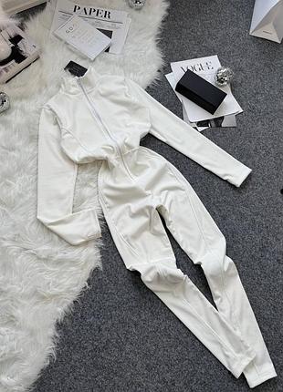 Жіночий теплий комбінезон з перестрочками термо пума на змійці комбез