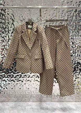 Брючный костюм, костюм жакет та брюки