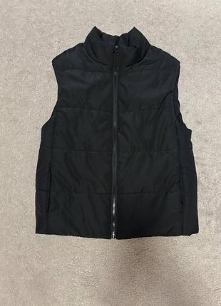 Жіноча жилетка