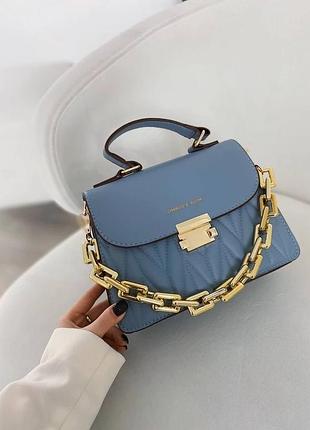 Женская голубая сумочка