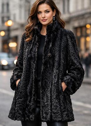 Розкішна чорна шуба з фактурного хутра